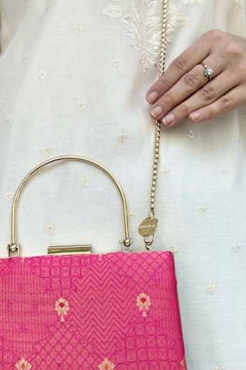 Amyra_Pink Zahri Trapezium Clutch Bag_at_Aza_Fashions