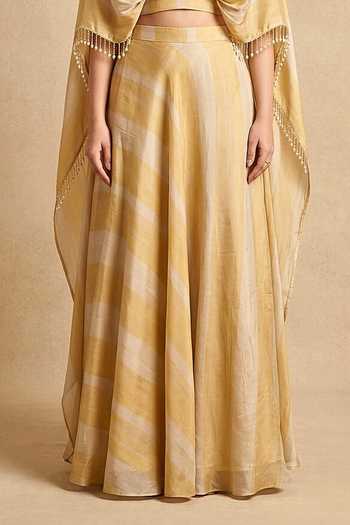Buy_Two Sisters By Gyans_Gold Silk Keyhole Neck Molten Draped Cape And Lehenga Set _Online_at_Aza_Fashions