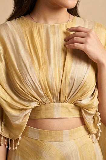 Two Sisters By Gyans_Gold Silk Keyhole Neck Molten Draped Cape And Lehenga Set _at_Aza_Fashions