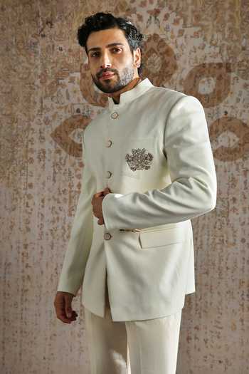 Asuka_Ivory Suiting Embroidery Royal Crest Bandhgala And Trouser Set _Online_at_Aza_Fashions