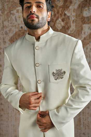 Buy_Asuka_Ivory Suiting Embroidery Royal Crest Bandhgala And Trouser Set _Online_at_Aza_Fashions