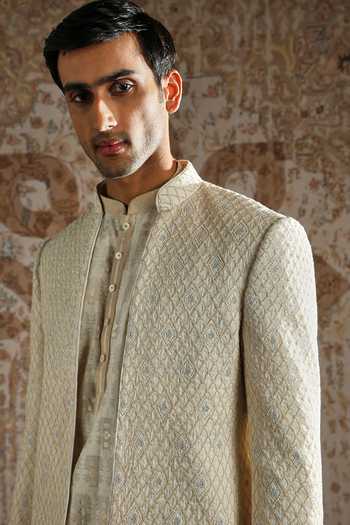 Asuka_Ivory Silk, Chanderi Zari Textured Regal Bandhgala Set _at_Aza_Fashions