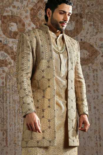 Asuka_Gold Silk Antique Brocade Pattern Sherwani Set _at_Aza_Fashions
