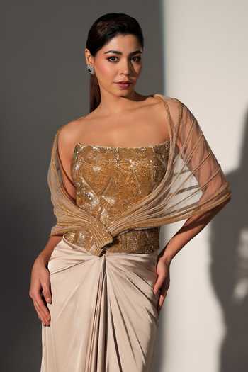 Libas Cafe by Nidhi & Ashish_Gold Satin, Net Sequins Square Neck Elise Power Shoulder Corset Skirt Set _at_Aza_Fashions