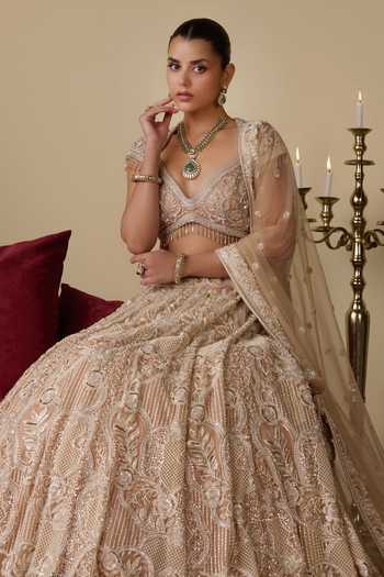 Shop_Chaashni By Maansi And Ketan_Gold Net Sweetheart Neck Sequin Stone Embellished Bridal Lehenga Set _Online_at_Aza_Fashions