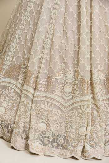 Shop_Chaashni By Maansi And Ketan_Beige Net Sweetheart Neck Beaded Jaal Embellished Bridal Lehenga Set _Online_at_Aza_Fashions