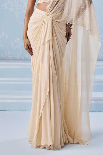 Seema Thukral Ivory Georgette, Satin High Neck Willow Pre-draped Saree And Blouse Set Online at Aza Fashions Seema Thukral_Ivory Georgette, Satin High Neck Willow Pre-draped Saree And Blouse Set _Online_at_Aza_Fashions