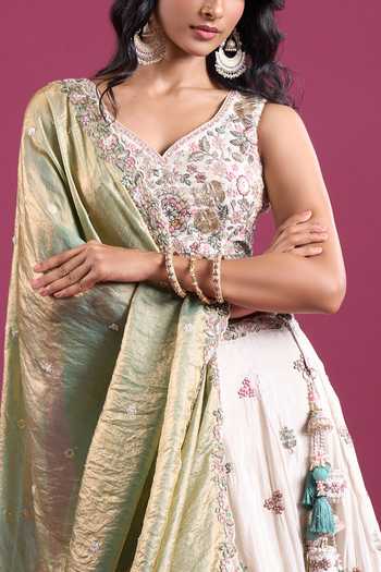 Buy Samyukta Singhania Cream Tissue Sweetheart Neck Sequins Embroidered Lehenga Set Online at Aza Fashions Buy_Samyukta Singhania_Cream Tissue Sweetheart Neck Sequins Embroidered Lehenga Set _Online_at_Aza_Fashions