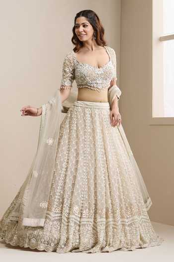 Chaashni By Maansi And Ketan_Beige Net Sweetheart Neck Beaded Jaal Embellished Bridal Lehenga Set _Online_at_Aza_Fashions