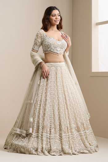 Buy_Chaashni By Maansi And Ketan_Beige Net Sweetheart Neck Beaded Jaal Embellished Bridal Lehenga Set _Online_at_Aza_Fashions