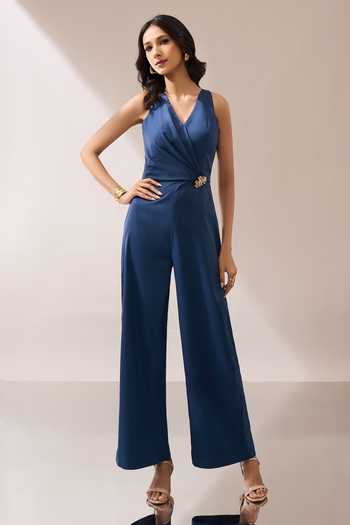 Naintara Bajaj_Blue Placement Brooch Halter Jumpsuit _Online_at_Aza_Fashions