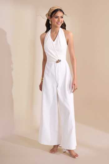 Buy_Naintara Bajaj_Ivory Halter Neck Wide Leg Jumpsuit _Online_at_Aza_Fashions