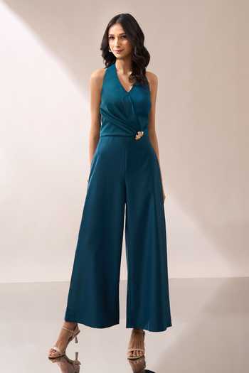 Naintara Bajaj_Teal Halter Neck Placed Brooch Jumpsuit _Online_at_Aza_Fashions