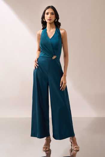 Shop_Naintara Bajaj_Teal Halter Neck Placed Brooch Jumpsuit _Online_at_Aza_Fashions