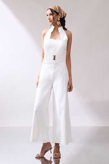 Naintara Bajaj_Ivory High Collar Jumpsuit And Buckle Belt Set _at_Aza_Fashions