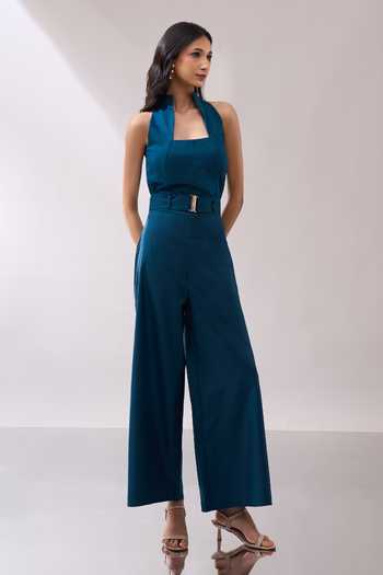 Naintara Bajaj_Teal High Collar Structured Jumpsuit With Belt _at_Aza_Fashions