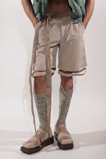 Shop_Jubinav Chadha_Beige Suede Levitating Effect Tailored Shorts _Online_at_Aza_Fashions