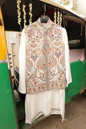 Buy_Dev Ki Raha_Ivory Linen, Velvet Romeo Mood Embroidered Bundi And Kurta Set _Online_at_Aza_Fashions