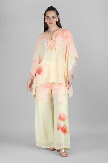 Buy_Mandira Wirk_Yellow Crepe, Viscose Split V-neck, Yes Peach Tulip Printed Kurta And Palazzo Set _Online_at_Aza_Fashions