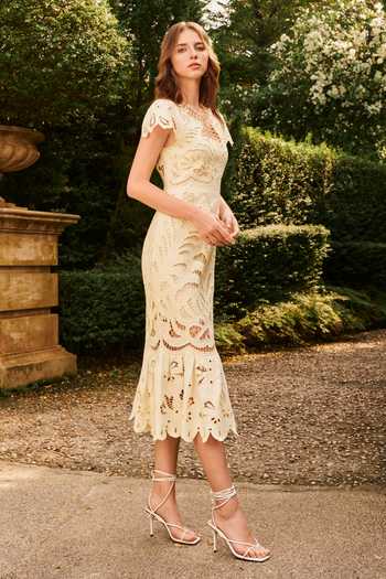 Shop_House Of Eda_Yellow Linen Round Neck Guinevere Embroidered Midi Dress _Online_at_Aza_Fashions