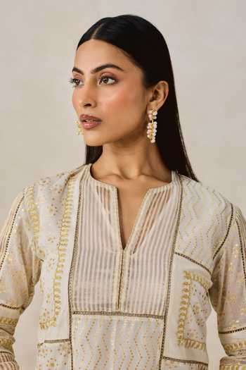 Nitika Gujral Ivory Chanderi Split V-neck Gold Patch Work Kurta And Salwar Set at Aza Fashions Nitika Gujral_Ivory Chanderi Split V-neck Gold Patch Work Kurta And Salwar Set _at_Aza_Fashions