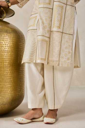 Buy Nitika Gujral Ivory Chanderi Split V-neck Gold Patch Work Kurta And Salwar Set Buy_Nitika Gujral_Ivory Chanderi Split V-neck Gold Patch Work Kurta And Salwar Set