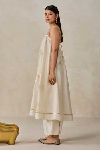 Buy_Nitika Gujral_Ivory Chanderi Halter Neck Floral Applique Anarkali With Pant _Online_at_Aza_Fashions