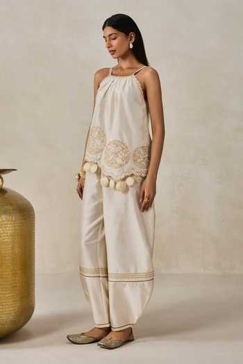 Buy Nitika Gujral Ivory Chanderi Halter Neck Applique Embroidered Top And Salwar Set Online at Aza Fashions Buy_Nitika Gujral_Ivory Chanderi Halter Neck Applique Embroidered Top And Salwar Set _Online_at_Aza_Fashions