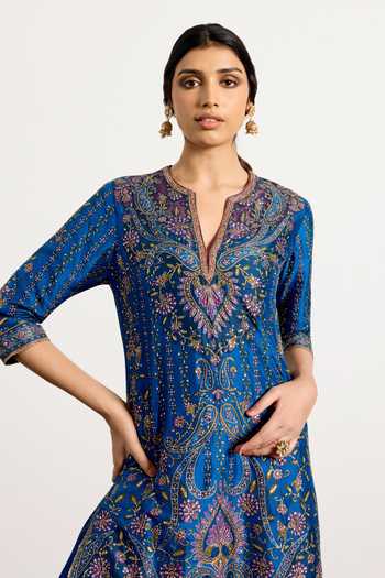 RI.Ritu Kumar Blue Dupion, Chiffon, Viscose Split V-neck Prisha Printed Kurta Gharara Set at Aza Fashions RI.Ritu Kumar_Blue Dupion, Chiffon, Viscose Split V-neck Prisha Printed Kurta Gharara Set _at_Aza_Fashions