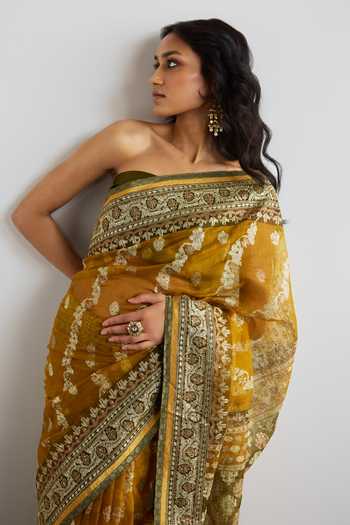 Shop_RI.Ritu Kumar_Mustard Silk Organza Floral Woven Saree With Unstitched Blouse Piece _Online_at_Aza_Fashions