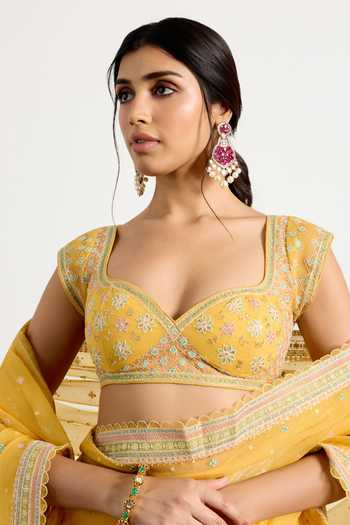 RI.Ritu Kumar_Yellow Silk Organza Sweetheart Neck Saree With Unstitched Blouse Piece _at_Aza_Fashions