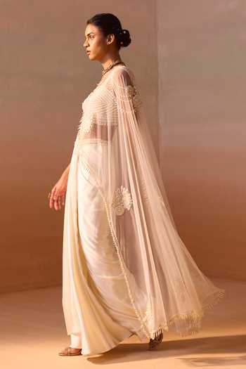 Buy_Nitika Gujral_Ivory Satin, Net Sweetheart Neck Pearl Work Pre-draped Saree With Bustier _Online_at_Aza_Fashions