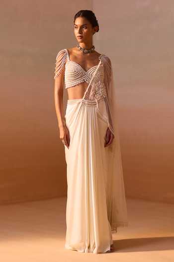 Shop_Nitika Gujral_Ivory Satin, Net Sweetheart Neck Pearl Work Pre-draped Saree With Bustier _Online_at_Aza_Fashions