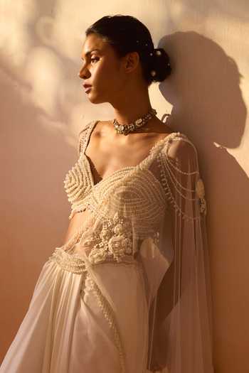Buy_Nitika Gujral_Ivory Satin, Net Sweetheart Neck Pearl Work Pre-draped Saree With Bustier 