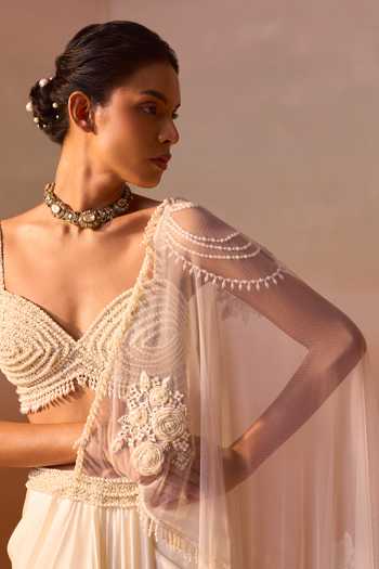 Shop_Nitika Gujral_Ivory Satin, Net Sweetheart Neck Pearl Work Pre-draped Saree With Bustier 