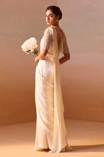 Nitika Gujral_Ivory Satin, Net V-neck Pre-draped Saree With Embroidered Blouse _Online_at_Aza_Fashions