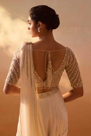 Buy_Nitika Gujral_Ivory Satin, Net V-neck Pre-draped Saree With Embroidered Blouse _Online_at_Aza_Fashions