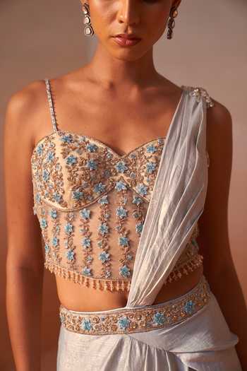 Nitika Gujral_Blue Satin, Net Sweetheart Neck Shimmer Pre-draped Saree With Blouse _at_Aza_Fashions