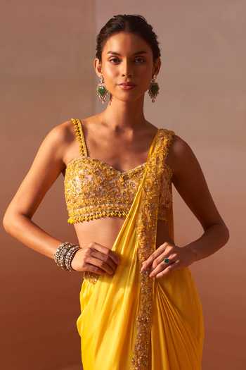 Nitika Gujral_Yellow Satin, Net Sweetheart Neck Pre-draped Saree With Beaded Blouse _at_Aza_Fashions