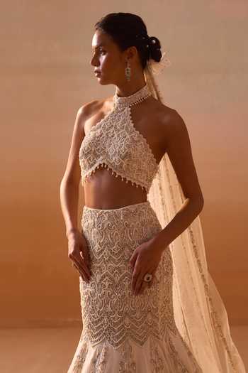 Nitika Gujral_Ivory Satin, Net Halter Neck, Choker Embellished Fishtailed Skirt With Blouse _Online_at_Aza_Fashions