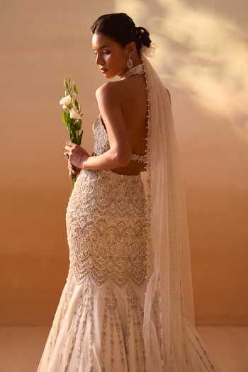 Buy_Nitika Gujral_Ivory Satin, Net Halter Neck, Choker Embellished Fishtailed Skirt With Blouse _Online_at_Aza_Fashions