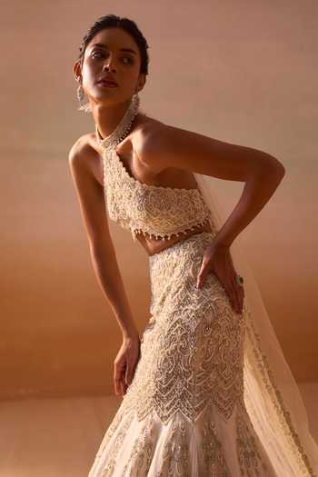 Shop_Nitika Gujral_Ivory Satin, Net Halter Neck, Choker Embellished Fishtailed Skirt With Blouse _Online_at_Aza_Fashions