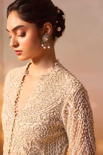 Buy Nitika Gujral Ivory Satin, Net V-neck Embroidered Long Jacket And Draped Skirt Set Online at Aza Fashions Buy_Nitika Gujral_Ivory Satin, Net V-neck Embroidered Long Jacket And Draped Skirt Set _Online_at_Aza_Fashions