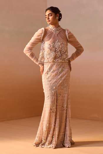 Nitika Gujral_Peach Satin, Net Halter Neck Embellished Slit Skirt And Bustier Set _Online_at_Aza_Fashions