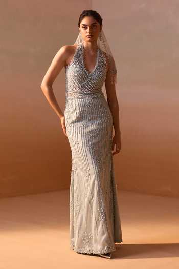 Nitika Gujral_Blue Satin, Net Pearls, Sequins, Crystals V-neck Embellished Corset Skirt Set _Online_at_Aza_Fashions