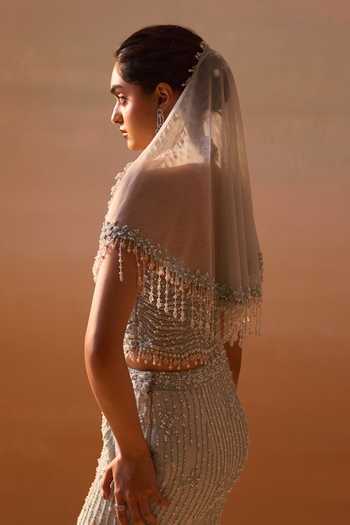 Buy_Nitika Gujral_Blue Satin, Net Pearls, Sequins, Crystals V-neck Embellished Corset Skirt Set _Online_at_Aza_Fashions