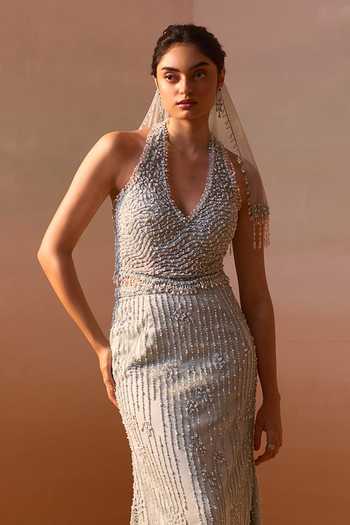 Shop_Nitika Gujral_Blue Satin, Net Pearls, Sequins, Crystals V-neck Embellished Corset Skirt Set _Online_at_Aza_Fashions