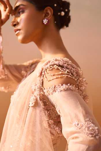 Nitika Gujral_Orange Organza, Satin, Net V-neck, Floral Embellished Peplum Kurta Gharara Set _at_Aza_Fashions