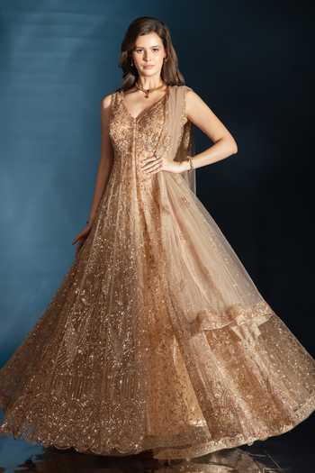 Saaj By Ankita Gold Tulle V-neck Embroidered Jacket Lehenga Set at Aza Fashions Saaj By Ankita_Gold Tulle V-neck Embroidered Jacket Lehenga Set _at_Aza_Fashions