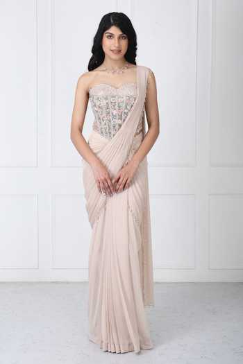 Isha Regalia_Beige Georgette, Net Pearls Pre-drape Saree With Floral Embroidered Corset _Online_at_Aza_Fashions